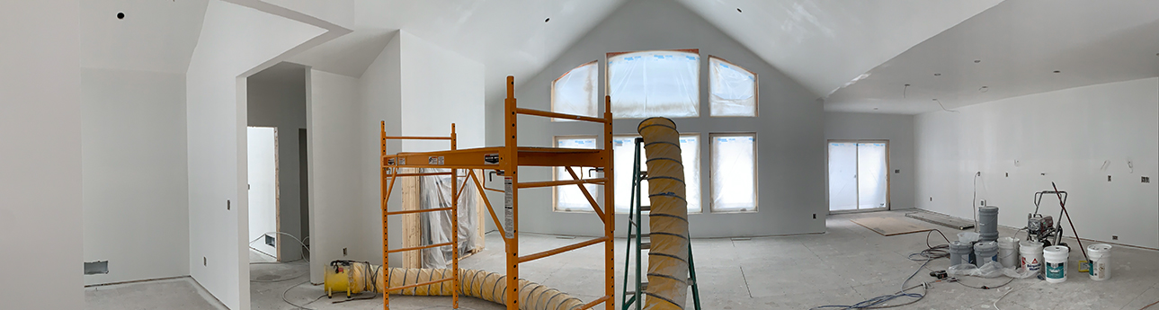 Professional painter applying fresh coat
